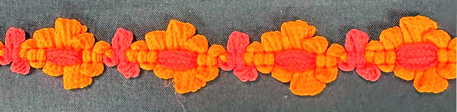 <font color="red">IN STOCK<br>MADE IN USA</font><br>9/16" Poly Knit Floral Braid-Orange/Hot Pink